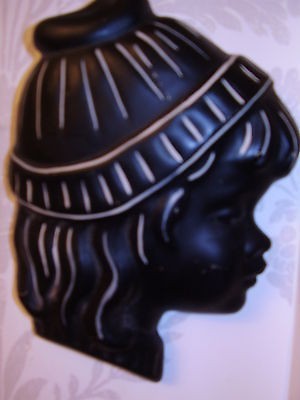 Chalkware wall plaque