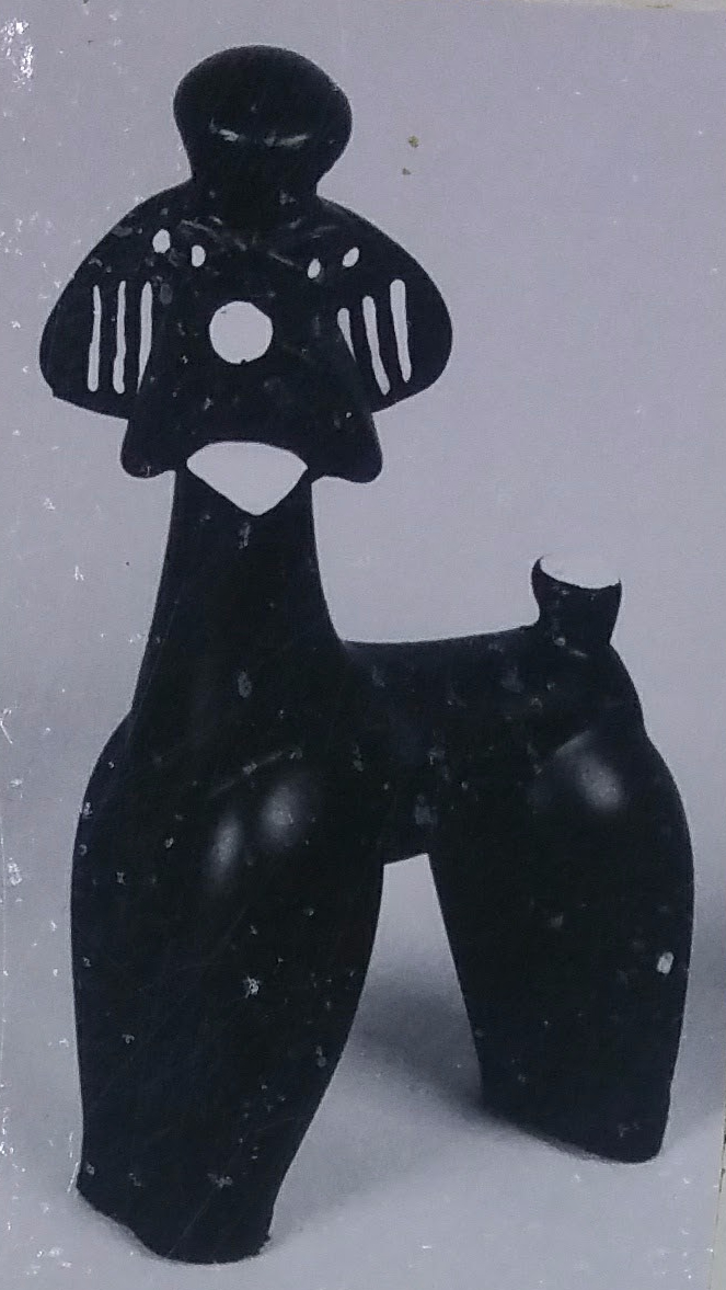 Black chalkware figurine of a poodle