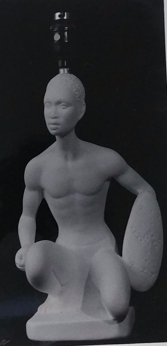 Raw chalkware figurine lamp