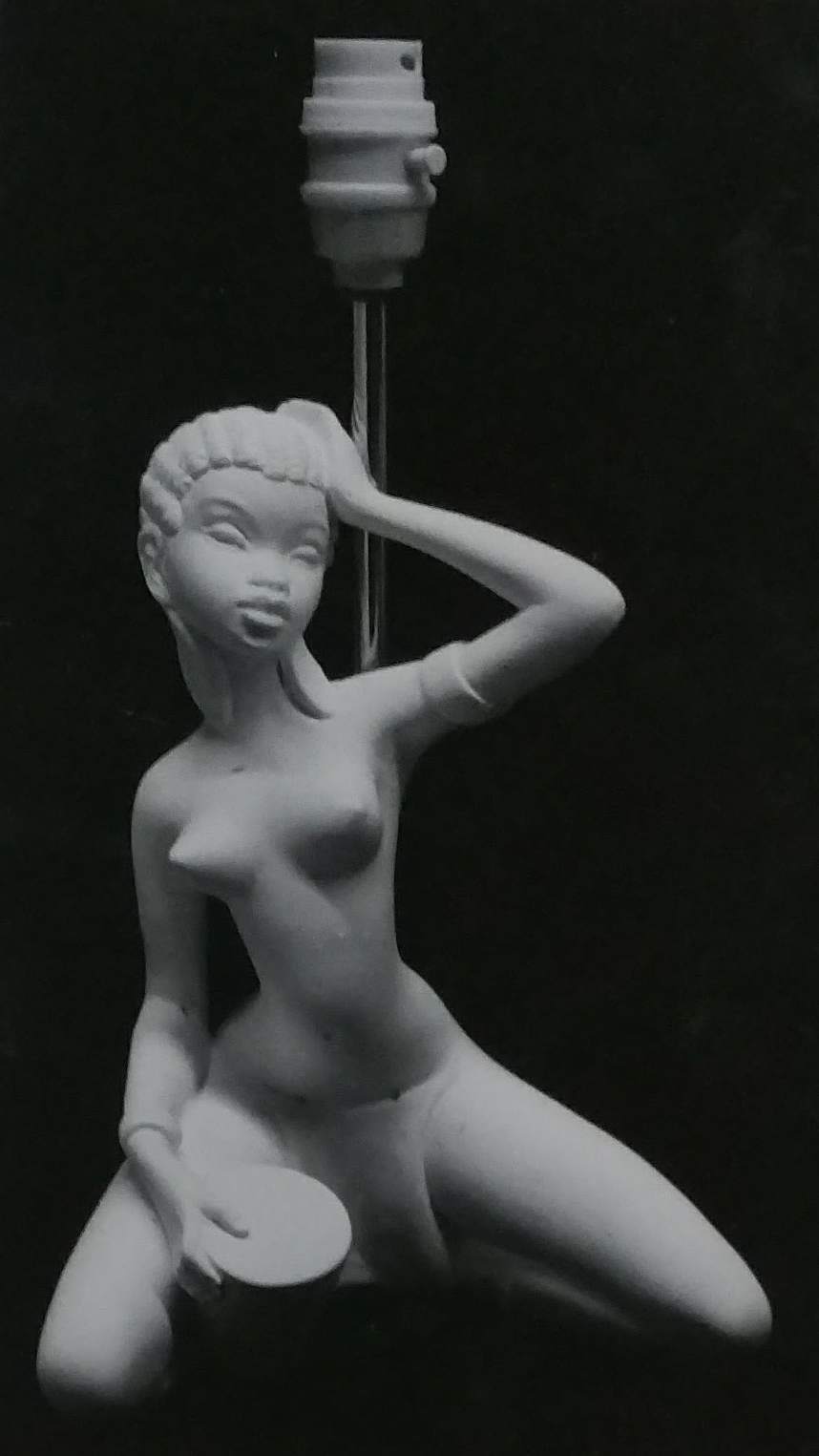 Raw chalkware statue lamp