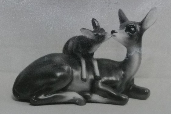 Adult and child reindeer chalkware statue
