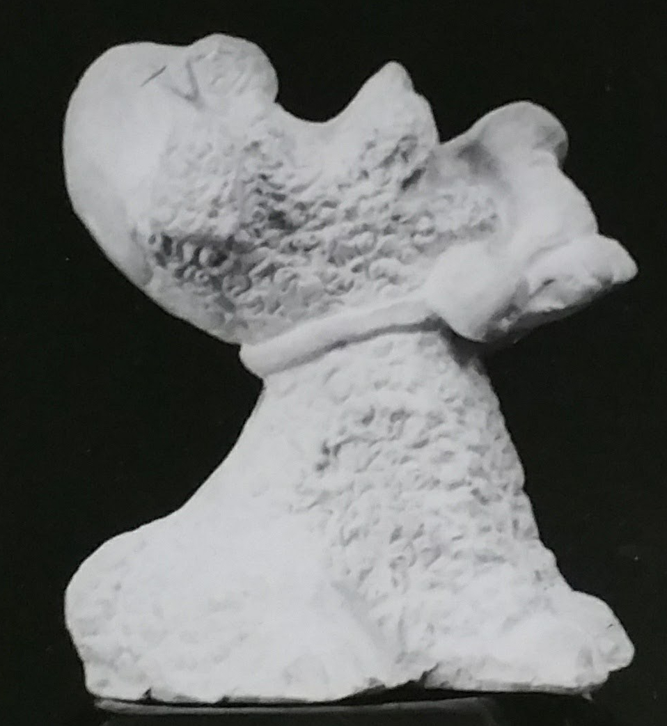 Raw chalkware dog statue