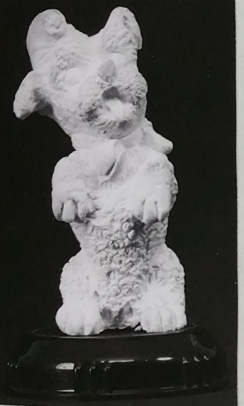 Raw chalkware dog statue