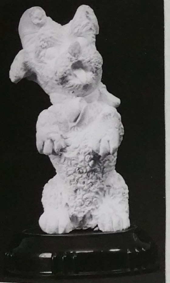 Raw chalkware dog statue