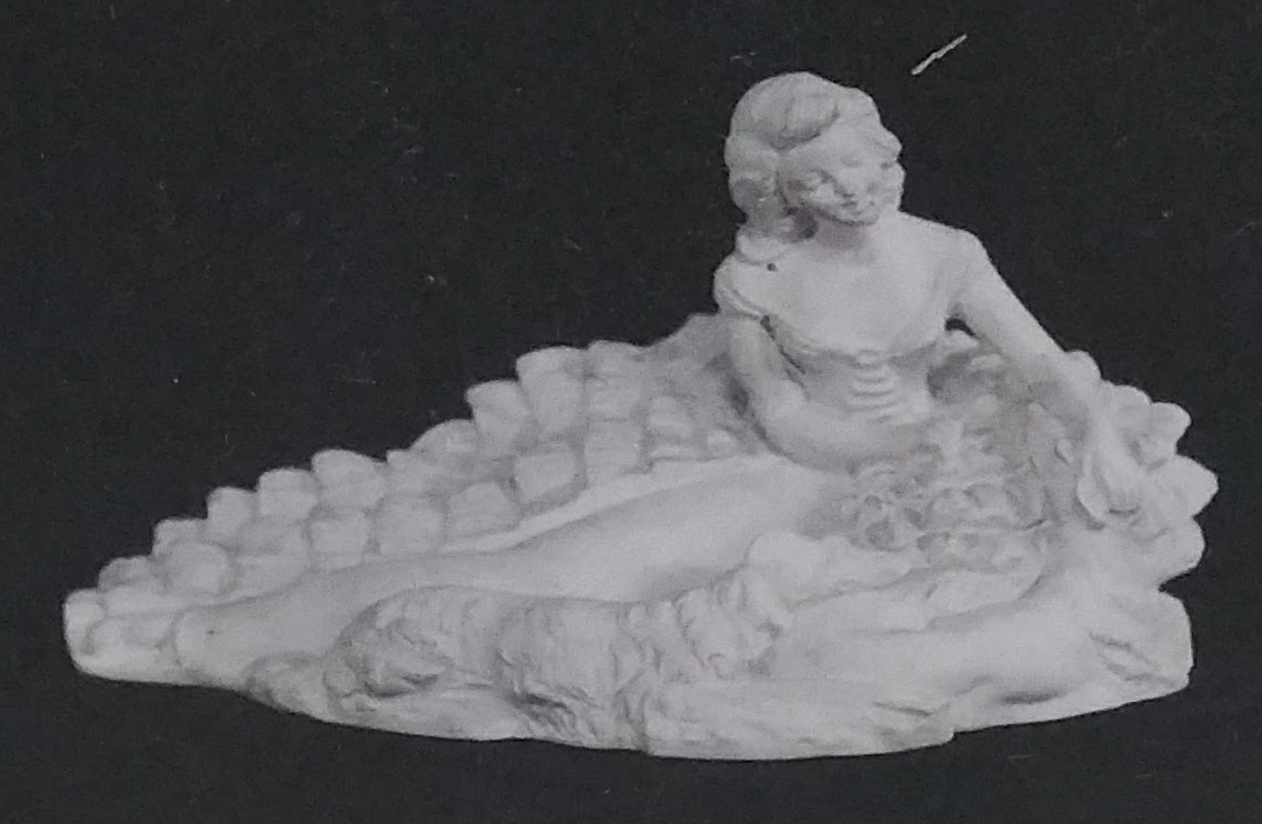 Black chalkware statue