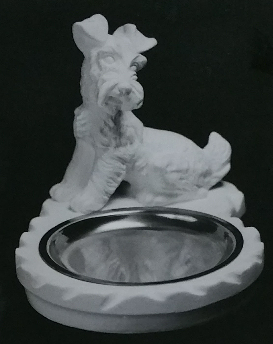 Raw chalkware dog statue