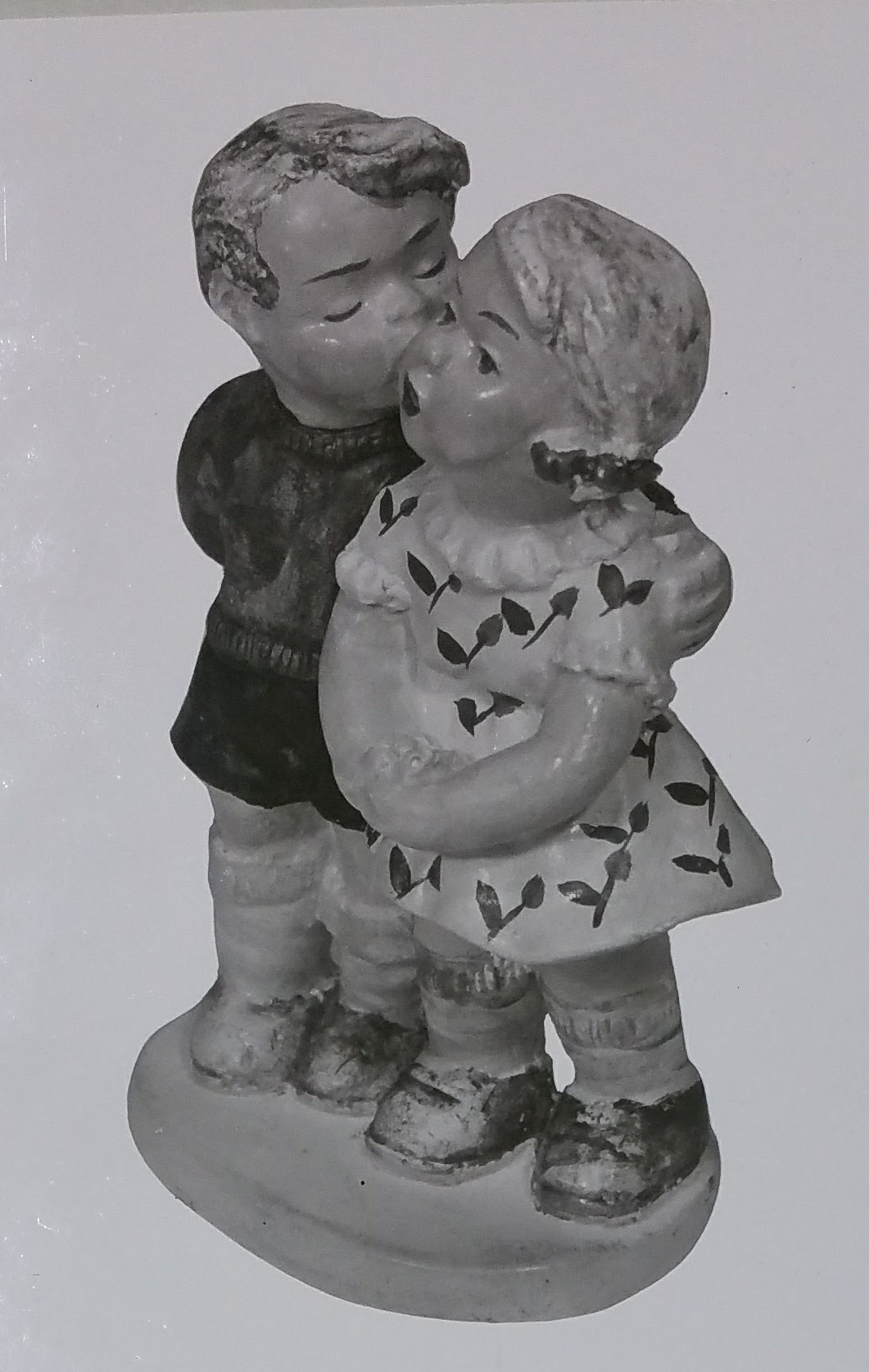 Boy and girl figurine
