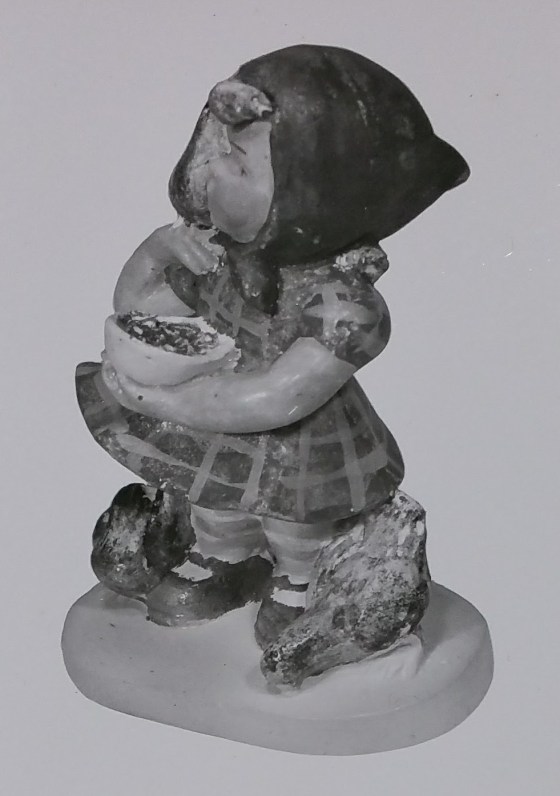 Farmer girl figurine