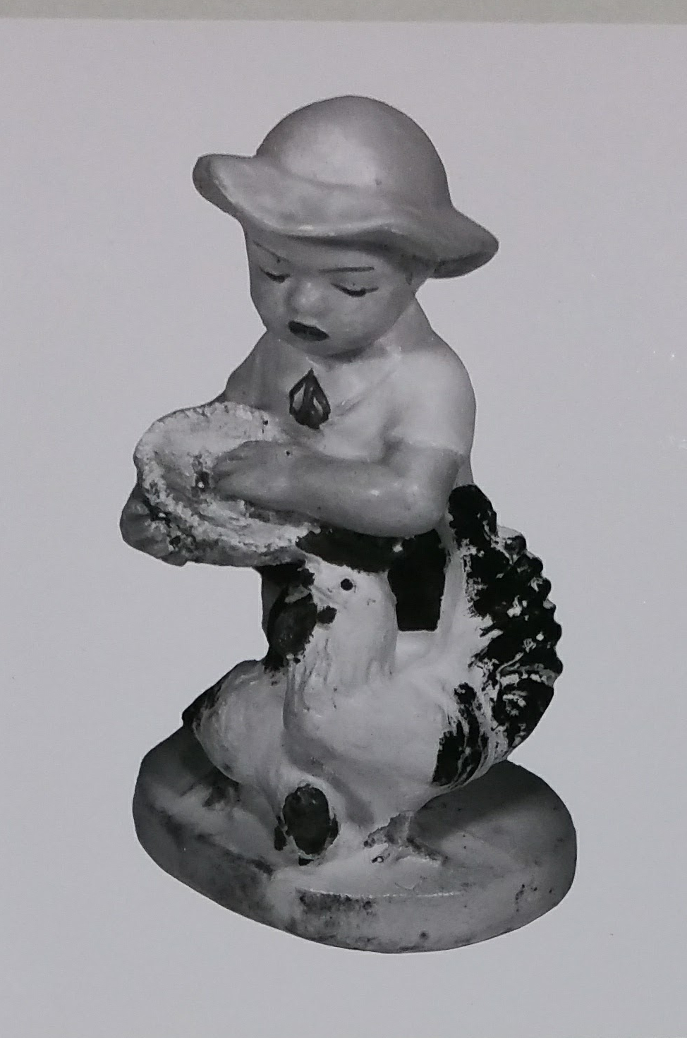 Farmer boy figurine