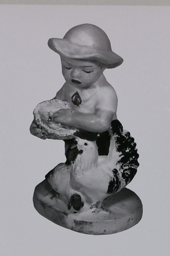 Farmer boy figurine