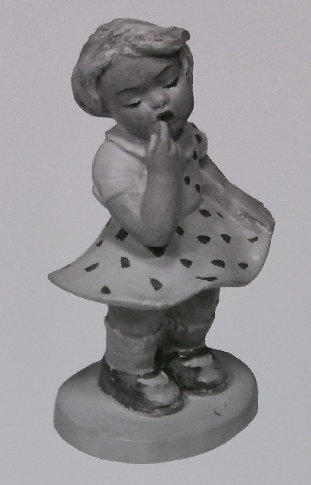 Raw chalkware girl statue
