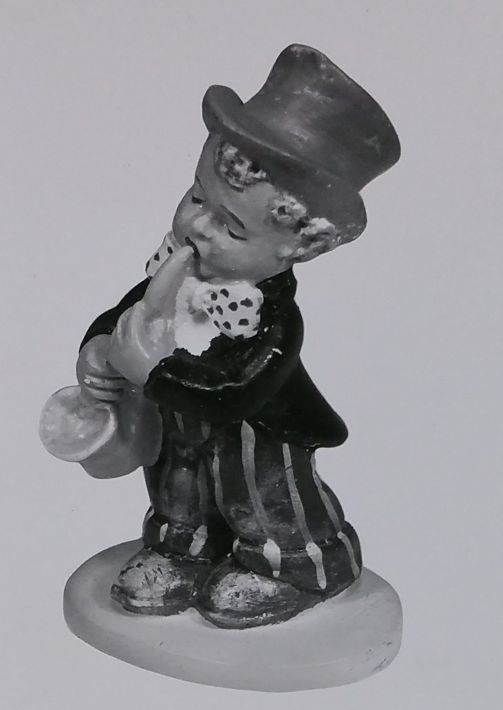 Boy musician figurine