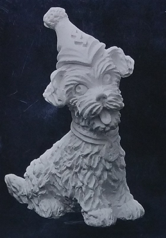 Raw chalkware dog statue