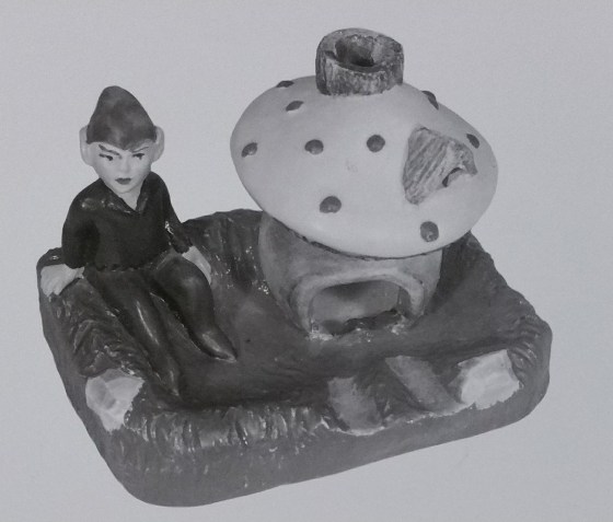 Pixie by house figurine