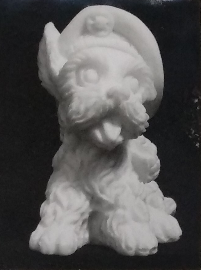 Raw chalkware dog statue