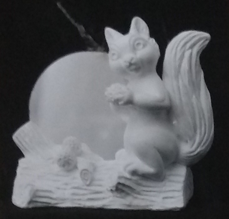Raw squirrel chalkware statue