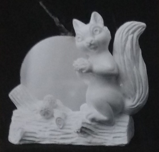 Raw squirrel chalkware statue