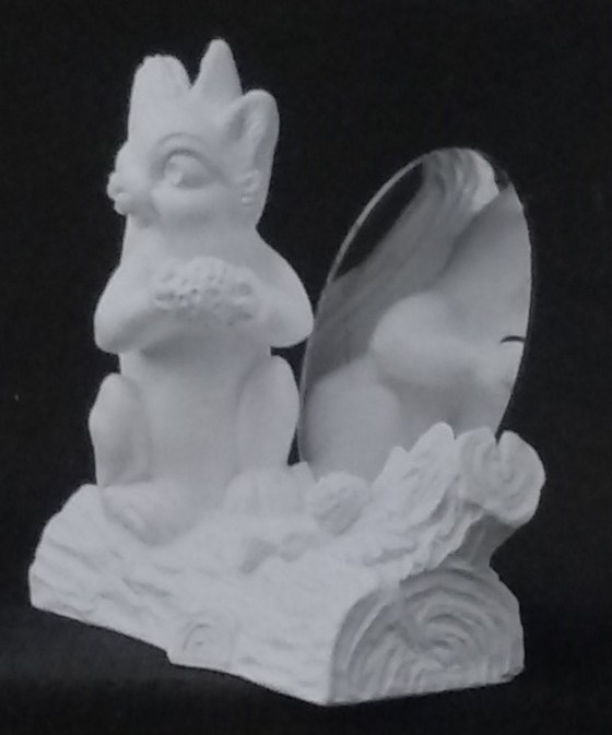 Raw squirrel chalkware statue