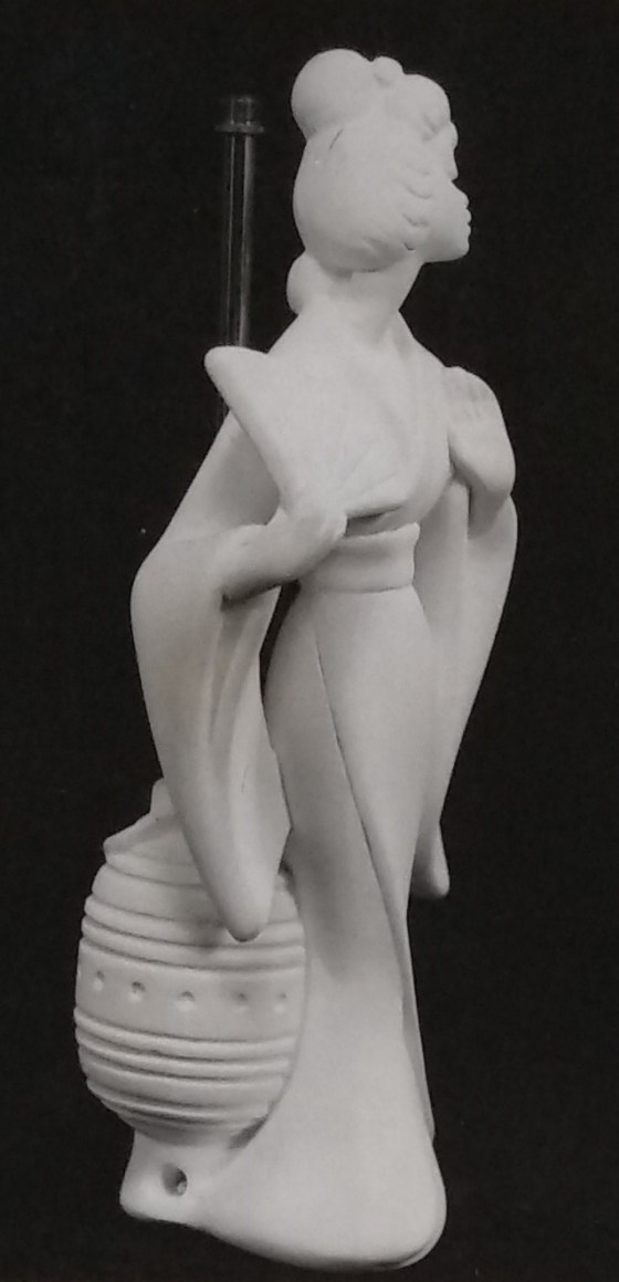 Raw chalkware statue lamp