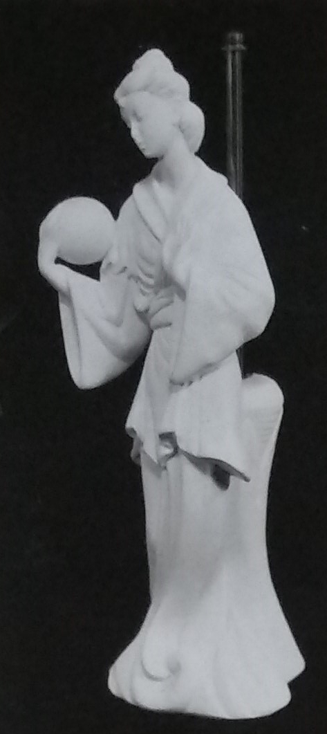 Raw white chalkware statue lamp