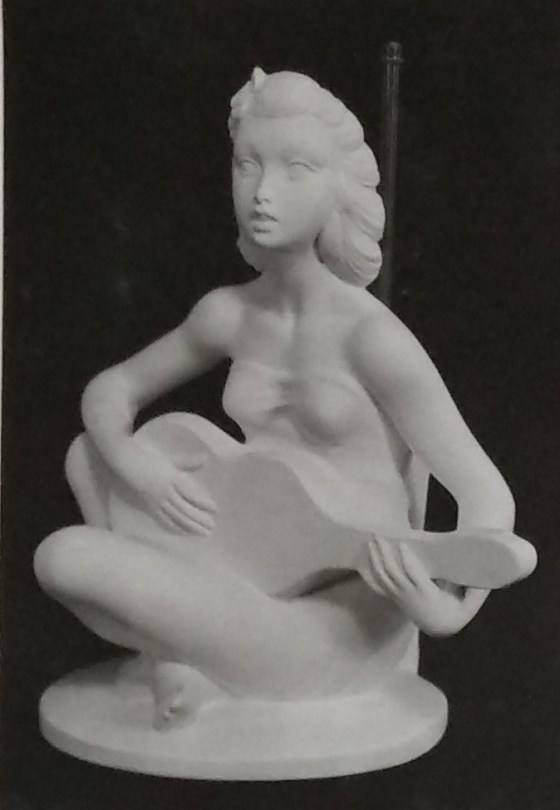 Raw white chalkware statue lamp