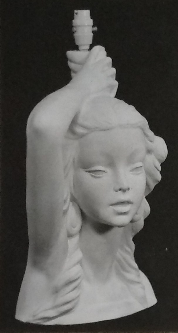 Top torso chalkware lamp