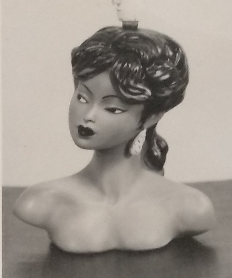 Top torso chalkware lamp