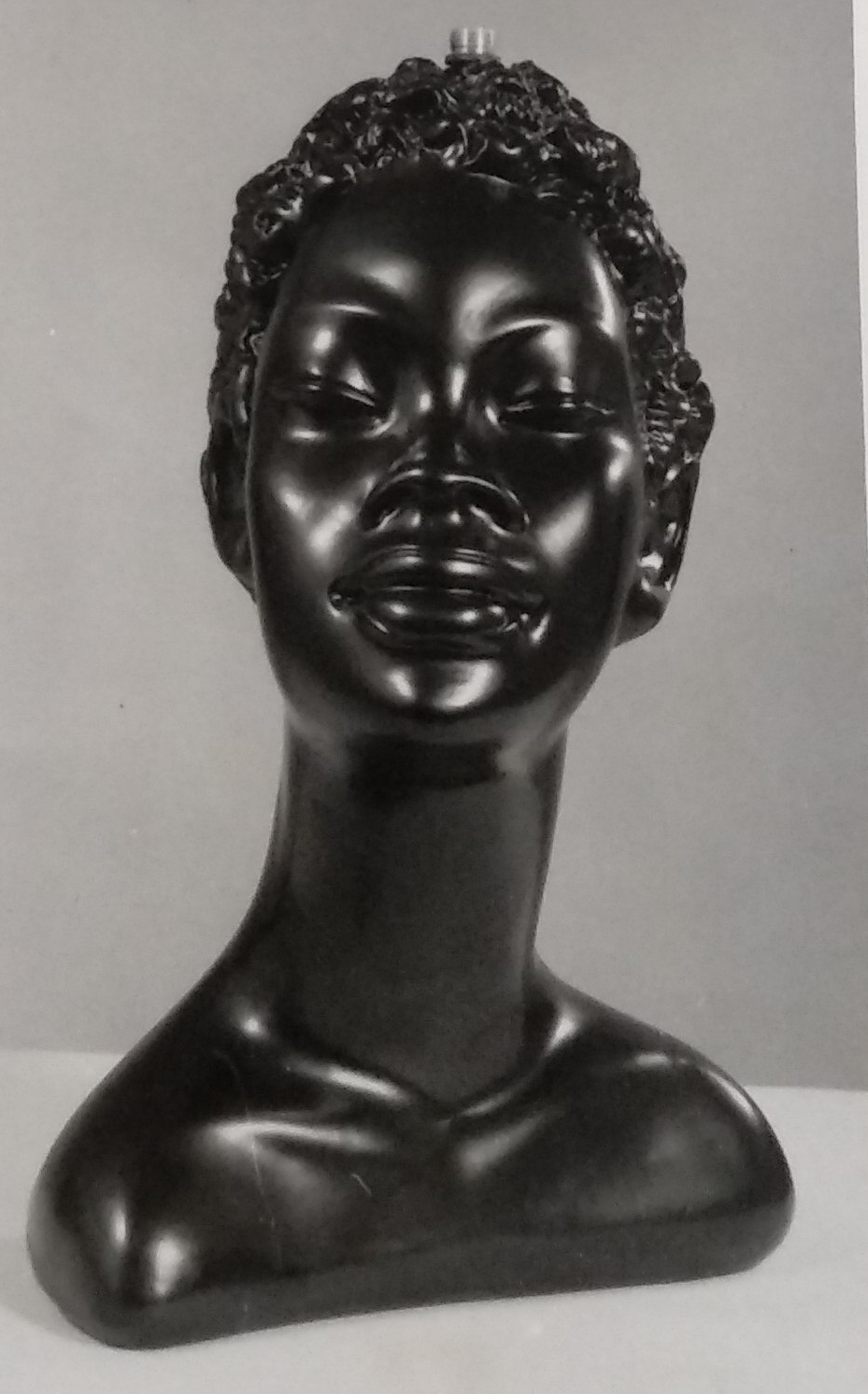 Female head bust made of chalkware