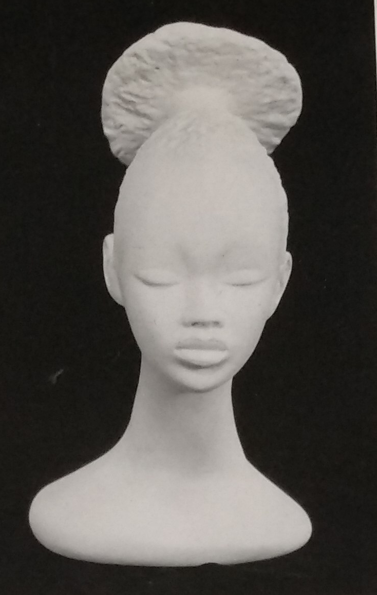 Raw chalkware female head bust