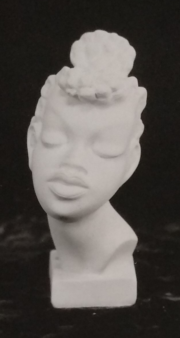 Raw chalkware lady head bust
