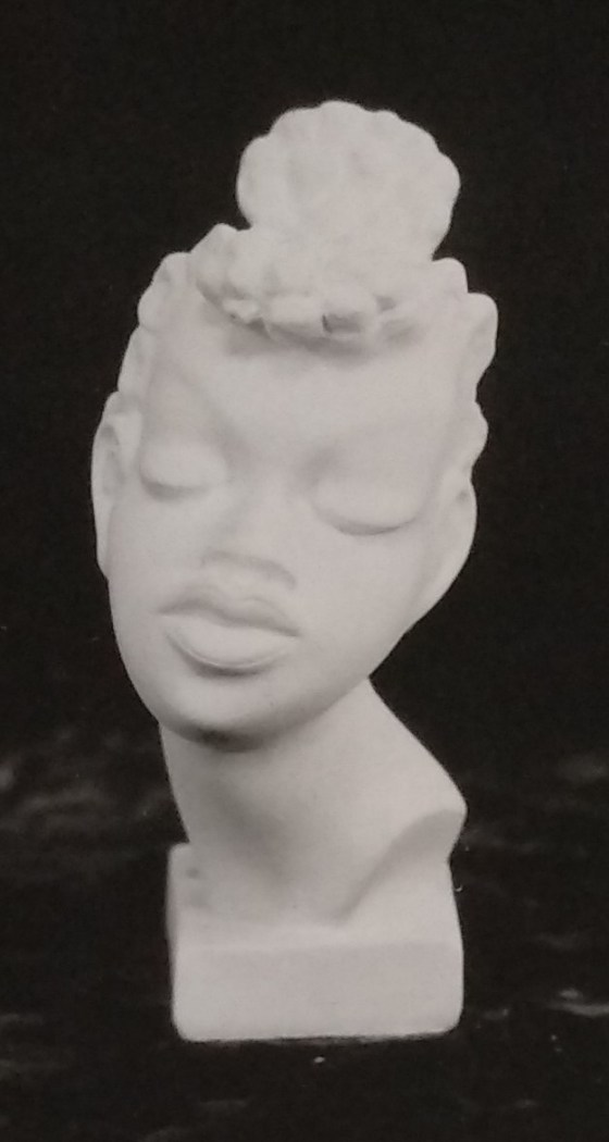 Raw chalkware lady head bust