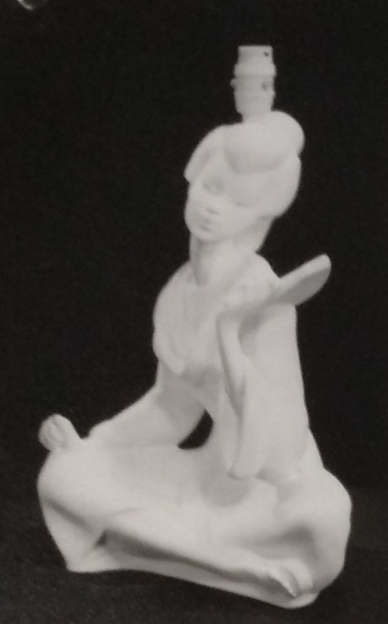 Seated lady white chalkware lamp
