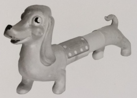 Long sausage dog figurine