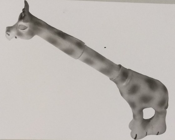 Tall giraffe figurine