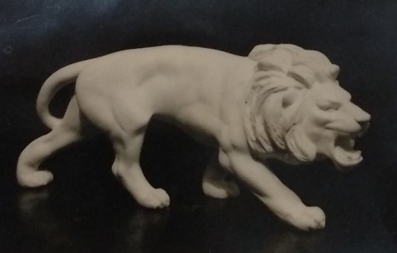Raw white chalkware lion