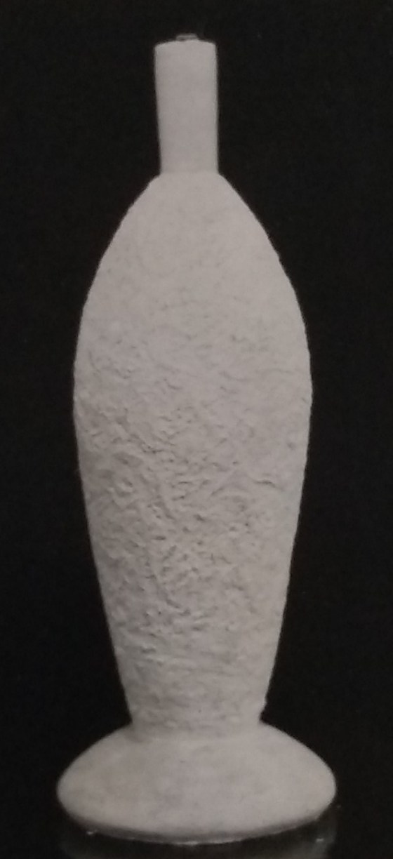 White standard lamp with random pattern on surface
