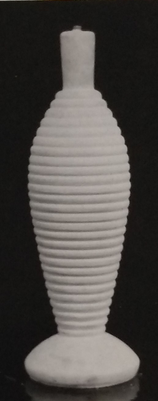 White standard lamp with circular ribbed pattern