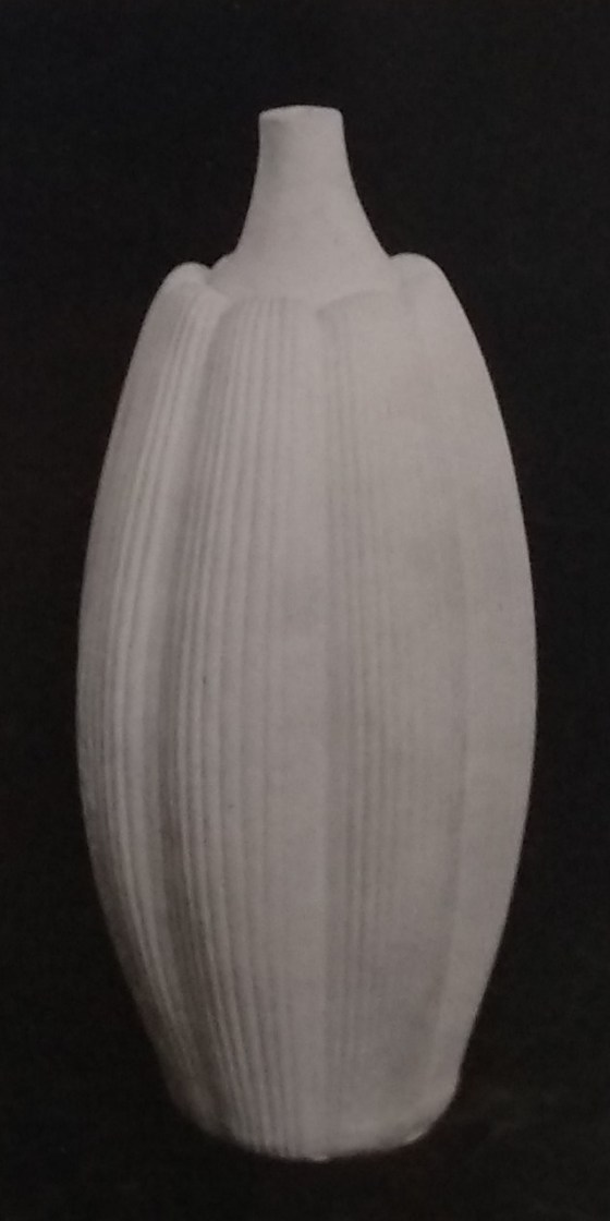 White standard lamp in a tall courgette pattern