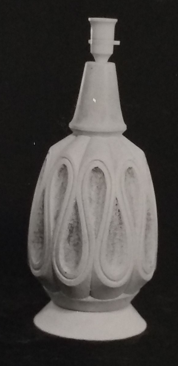 White standard lamp with large wavy horizontal lines