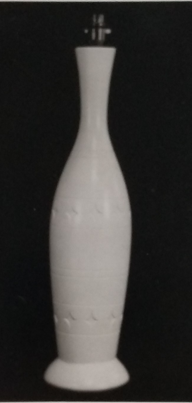 White standard lamp with diamond pattern at the bottom